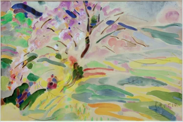 Manzano en flor frente a paisaje en Pretzfeld